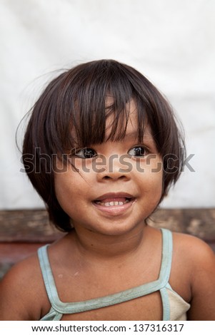 http://thumb10.shutterstock.com/display_pic_with_logo/10642/137316317/stock-photo-portrait-of-an-adorable-asian-girl-from-impoverished-area-in-the-philippines-137316317.jpg