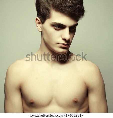 Naked male models posing in pics