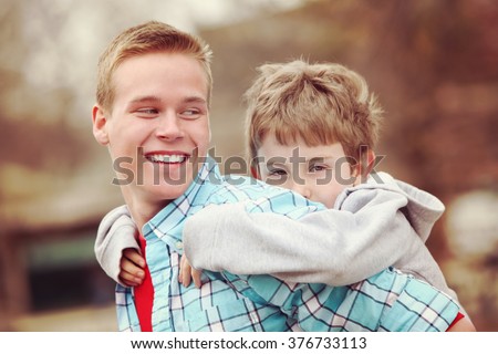 Little Boy Hugging Hugging Father Around Stock Photo 35390059 