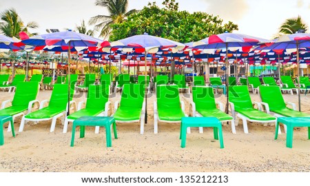 stock-photo-deck-chairs-on-the-beach-at-