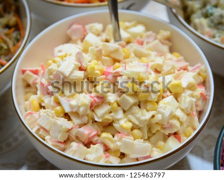 surimi crab sticks with lettuce crab sticks on a platter