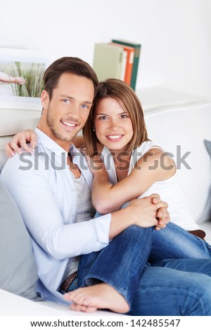 Contemporary Oil Painting Of Couple Hugging On Couch In