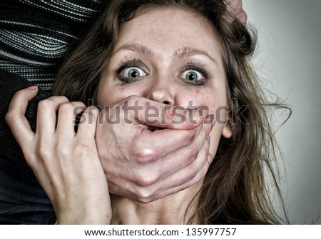Portrait of scared woman with tears. Violence concept - stock photo