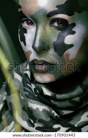 stock-photo-beautiful-young-fashion-woman-with-military-style-clothing-and-face-paint-make-up-khaki-colors-170901443.jpg