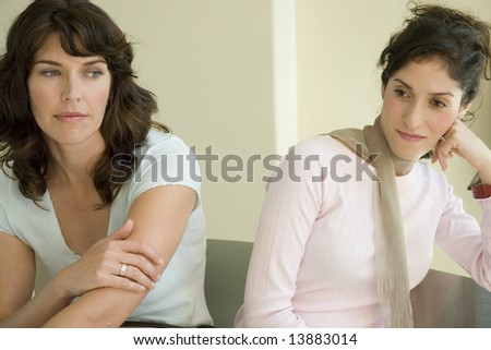 http://thumb10.shutterstock.com/display_pic_with_logo/79699/79699,1213740648,3/stock-photo-two-women-sitting-not-talking-to-each-other-13883014.jpg