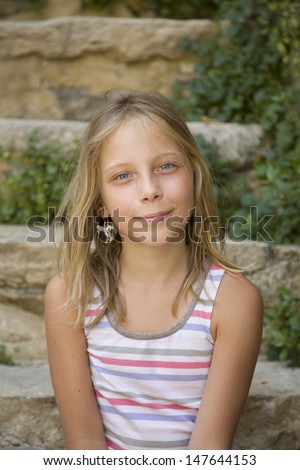 stock-photo-young-girl-smiles-sitting-on-an-outdoor-steps-147644153 How come Dating A Polish Woman So Eye-catching?