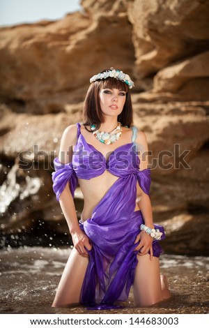 stock photo beautiful woman in water sea beach fantasy mermaid ocean greek goddess bright makeup woman girl 144683003