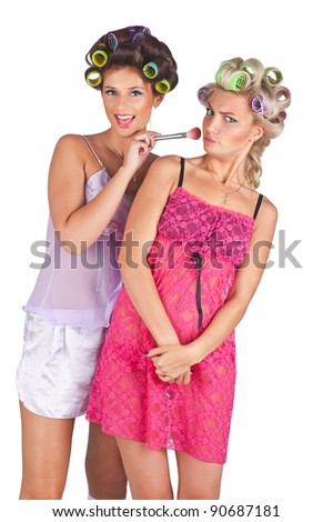 Girls in pyjamas with hair curlers have pyjamas party isolated on Girls in pyjamas with hair curlers have pyjamas party isolated on
