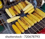 Small photo of Many roasted corns on the charcoal stove at rural market