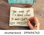 Small photo of Retro effect and toned image of a woman hand writing on a notebook. Handwritten quote You never get a second chance to make a good first impression as inspirational concept image