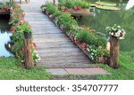 bamboo bridge with flower in...