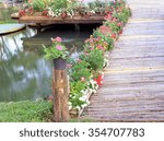 bamboo bridge with flower in...