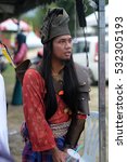 Small photo of Negeri Sembilan, Malaysia - 14th December 2014 : A man dressed in a traditional malay warrior armed with bow, arrow and keris during an event Temasya Zaman Kegemilangan Empayar Melayu