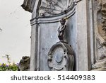 stock-photo-statue-of-a-pissing-boy-in-brussels-514409383.jpg