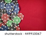 stock-photo-gambling-chips-for-poker-on-red-felt-background-449910067.jpg