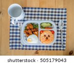 stock-photo-sad-bear-lunchbox-with-fired-rice-and-chicken-505179043.jpg