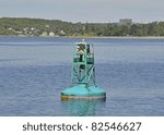 Small photo of Nautical Buoy at Halifax Harbour, Purcell's Cove Nova Scotia in the background