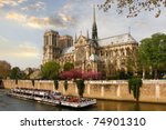 paris  notre dame  with boat on ...