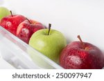Small photo of Fresh and clean apples on the refrigerator shelf. good to eat in diet.