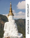 white big buddha statue at...