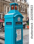 Small photo of LONDON, UK - OCTOBER 11, 2014 : Vintage blue police phone post in central London outside of Liverpool Street Railway Station. These boxes were introduced in 1891 for police and public use.