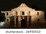 the alamo lit up at night in...