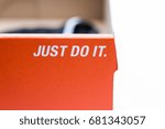 Small photo of Khonkaen, Thailand - July 21, 2017 : Nike wording "just do it" on orange box paper - illustrative editorial
