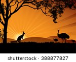 a silhouette of emus and...