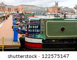 colorful narrow boat sterns
