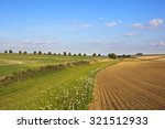 cultivated fields beside a...