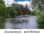 Small photo of Wallingford, UK. 24th June 2017. Boats pass along the River Thames at Wallingford in South Oxfordshire on a warm summer's day