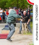 Small photo of SZEGED, HUNGARY - APRIL 26. 2015 - Excise officer (NAV) holds a presendation with a working dog in the 'Earth day' event in Szeged Zoo.