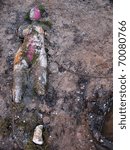 Small photo of Doll as a corpus delicti and illustrative material in and on the ground