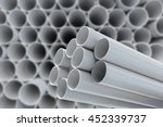 stock-photo-pvc-pipes-stacked-in-warehouse-452339737.jpg