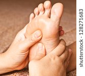 Small photo of reflexology foot massage, spa foot treatment,Thailand