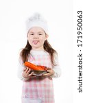 Small photo of A young girl has fun making something good to eat.