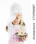 Small photo of A young chef enjoys using noodles to make something good to eat.
