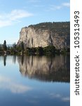 Small photo of McIntyre Bluffs and Vaseux Lake, Okanagan, BC, vertical. The calm water of Vaseux Lake mirror the McIntyre Bluffs in the Okanagan Valley, British Columbia, Canada.