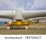 Small photo of Giant rotors of wind turbine on windmill construction yard to build windfarms at sea