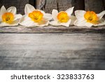 spring flowers on wooden...