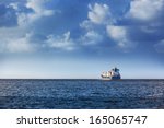 cargo ship in the ocean in the...