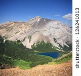 Small photo of Ribbon Lake, Mount Bogart Kananaskis Park, Alberta, Canada. As view from 20 minute hike up from Guinn Pass. Look closely, you should be able to sse the Wardens Cabin.