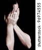 stock photo : Dramatic portrait of a young woman crying and covering her eyes on a black background with space for text