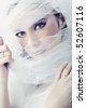 stock photo : Young brunette beauty or bride, behind a white veil