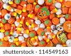 Spooky Orange Halloween Candy against a background - stock photo