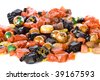 Closeup of Halloween candy -- mostly wrapped in orange and black.  Isolated on white. - stock photo