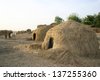 Grass huts of nomad Fulani people are a common sight in Mali, west Africa