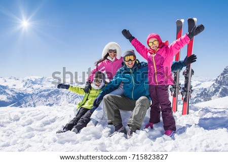 https://thumb10.shutterstock.com/display_pic_with_logo/101595/715823827/stock-photo-laughing-family-in-winter-vacation-with-ski-sport-on-snowy-mountains-happy-man-and-woman-with-sons-715823827.jpg