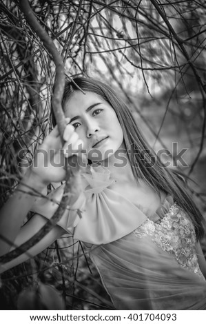 https://thumb10.shutterstock.com/display_pic_with_logo/1042555/401704093/stock-photo-portrait-of-asia-beautiful-woman-in-yellow-dress-on-nature-black-and-white-image-401704093.jpg