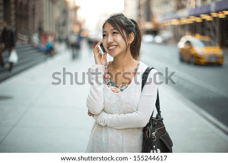 https://thumb10.shutterstock.com/display_pic_with_logo/1051921/155244617/stock-photo-asian-woman-walking-talking-on-a-phone-iphone-cellphone-155244617.jpg